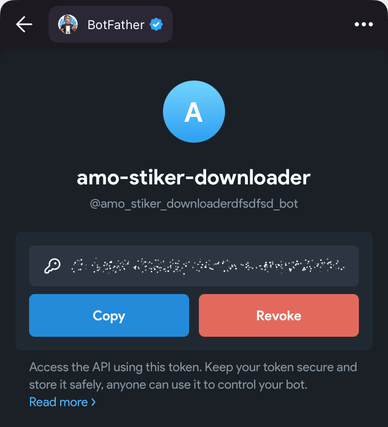 The new bot page in @BotFather: the token is hidden, the “Copy” and “Revoke” buttons are below it